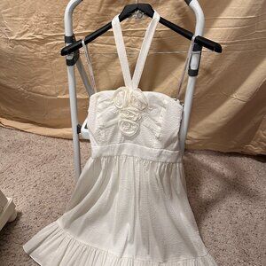 Off-white ruffled style dress strapless with V neck strips tying in the back